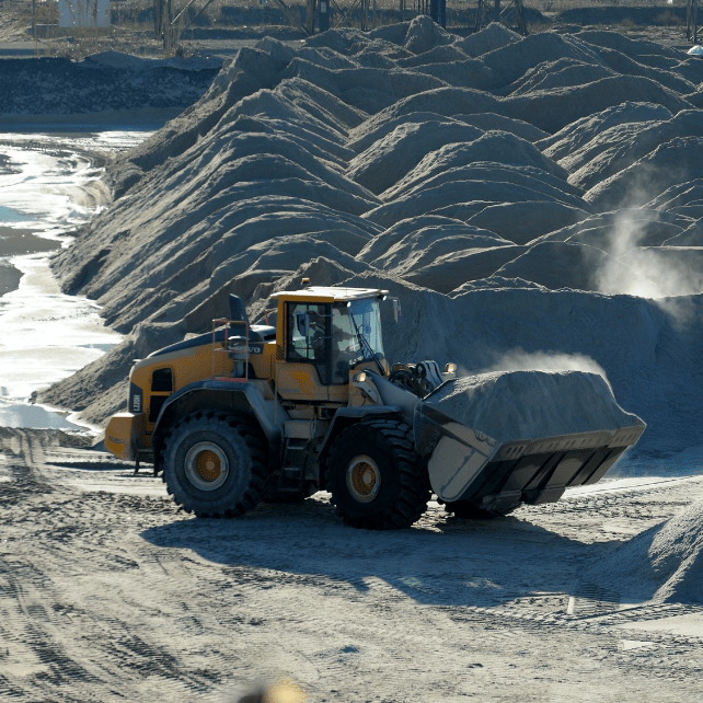 Image of digger on raw materials site