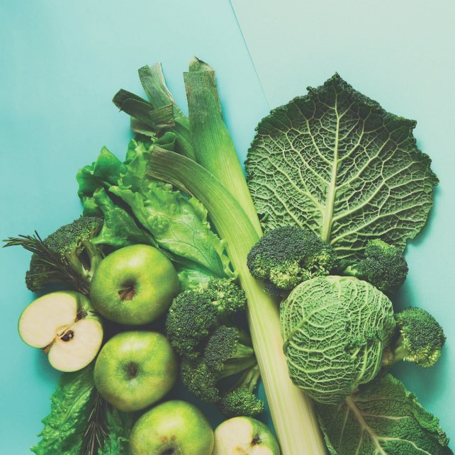 Image of green fruit and vegetables on green background
