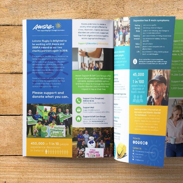 Aware Charity Northern Ireland annual report spread design and infographic 2019 on textured wooden background