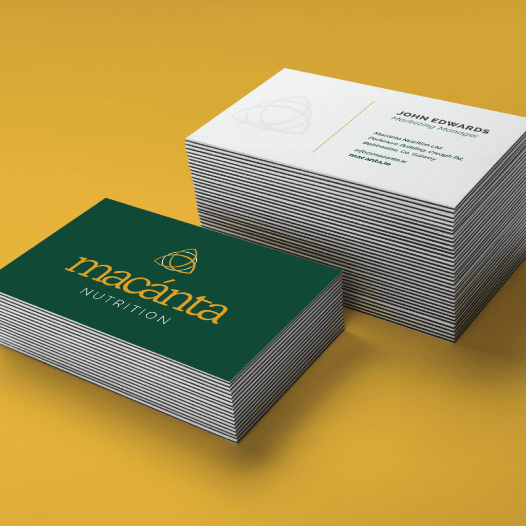 Macanta Business card stacks on yellow background